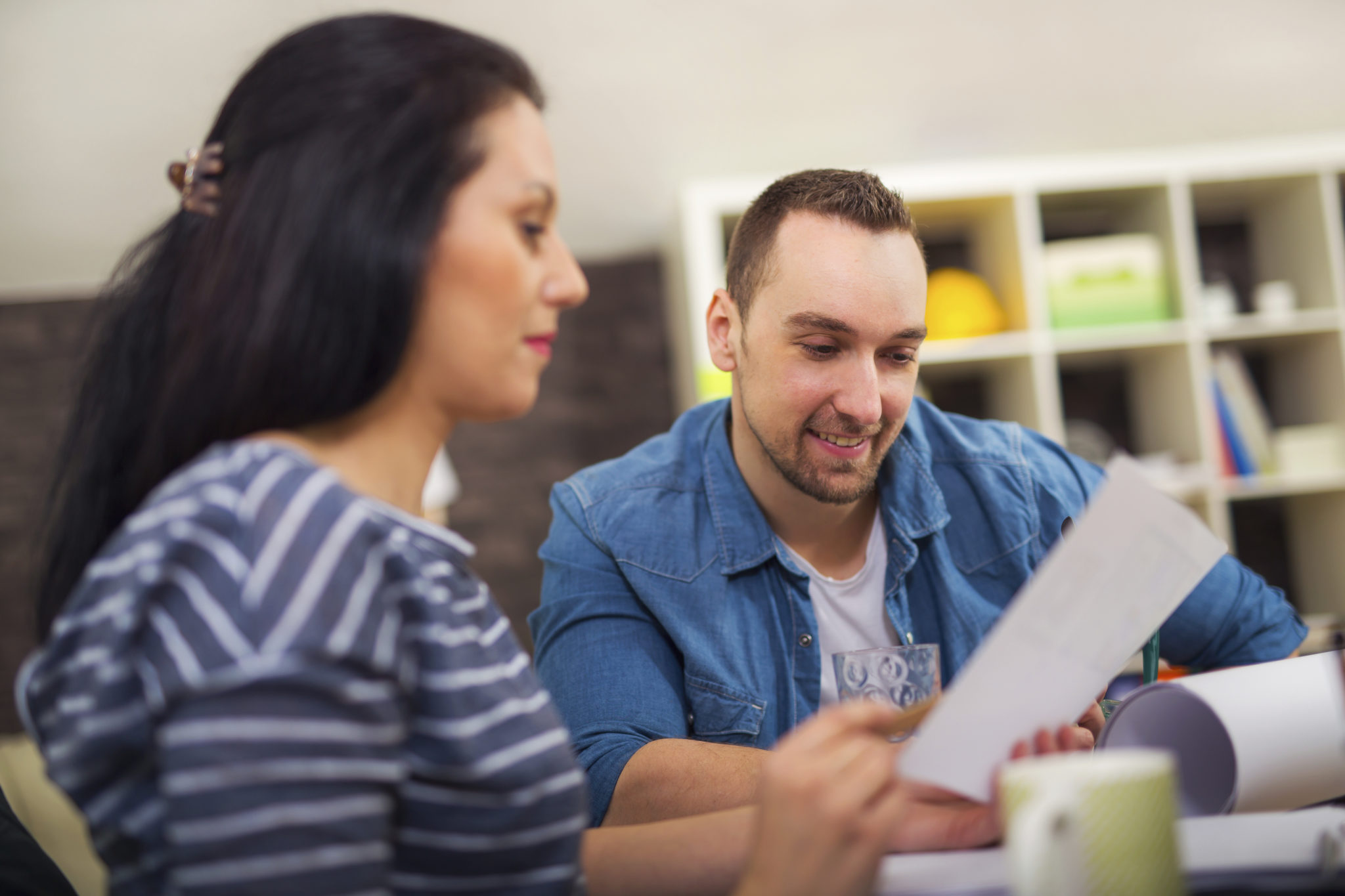 Two hipster managers working in the office. Small Business Owner.